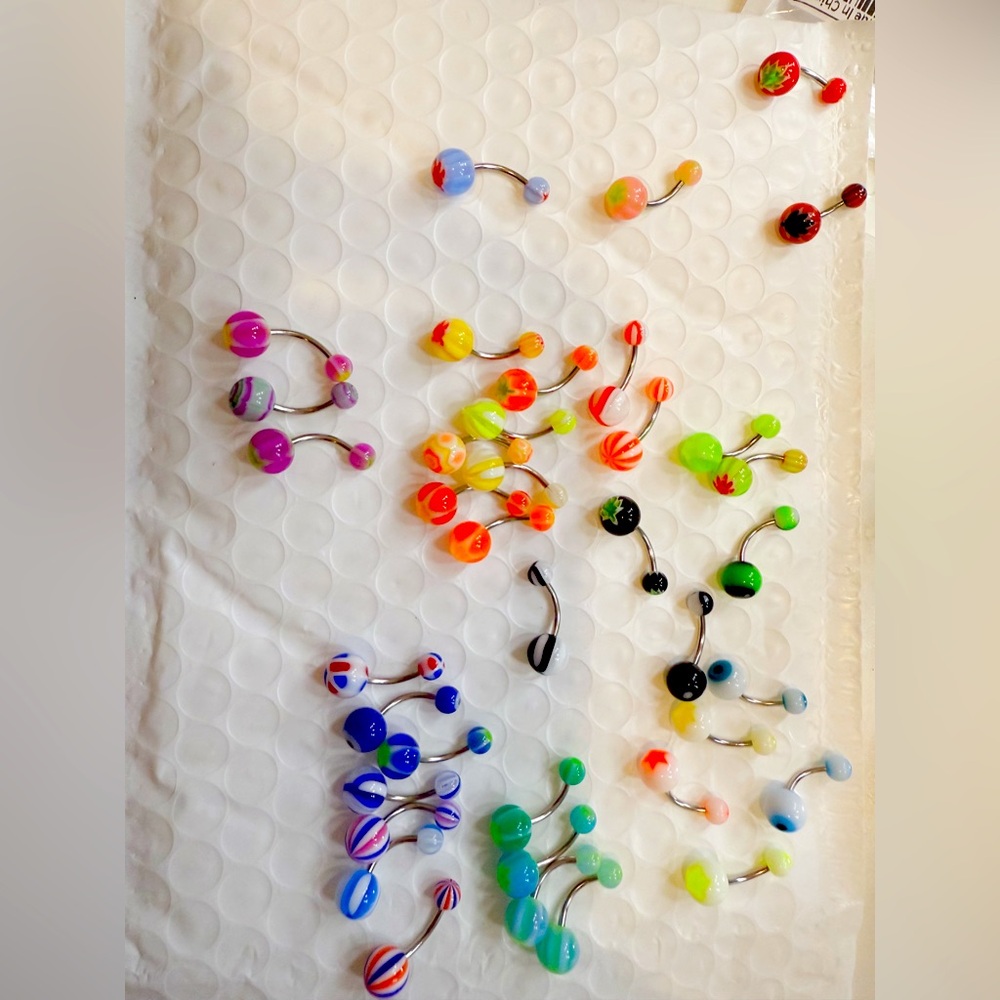 35 belly rings in package